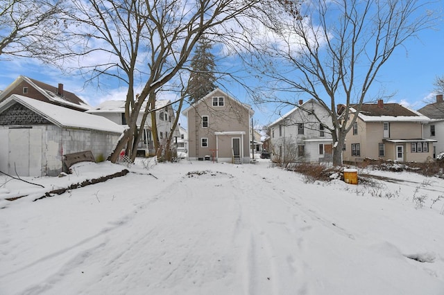 view of yard covered in snow