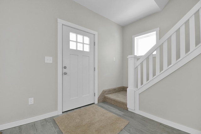 entrance foyer with hardwood / wood-style floors