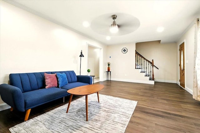 1645 Spring Village Ln, Mansfield, OH 44906 - living room featuring a ceiling fan, stairs, dark wood finished floors, ornamental molding, and recessed lighting