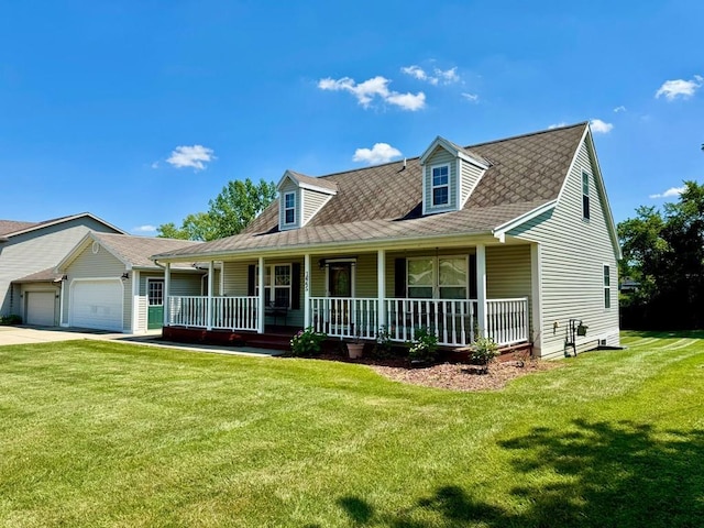 1645 Spring Village Ln, Mansfield, OH 44906 - cape cod house featuring covered porch, an attached garage, a front lawn, and concrete driveway