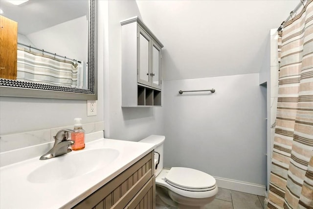 1645 Spring Village Ln, Mansfield, OH 44906 - bathroom with vanity, tile patterned floors, lofted ceiling, and curtained shower