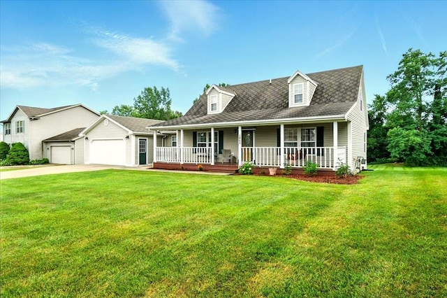 1645 Spring Village Ln, Mansfield, OH 44906 - new england style home with an attached garage, covered porch, concrete driveway, and a front lawn