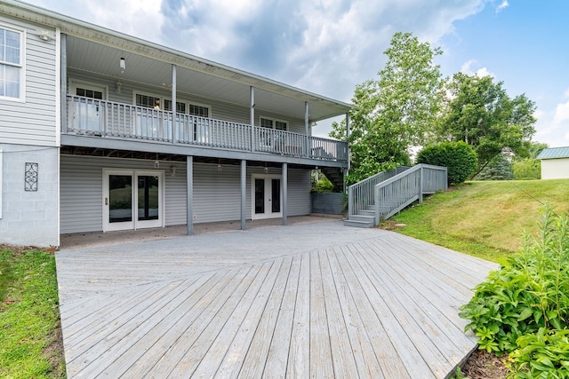 4299 County Road 20, Mount Gilead, OH 43338 - wooden deck featuring french doors and a lawn