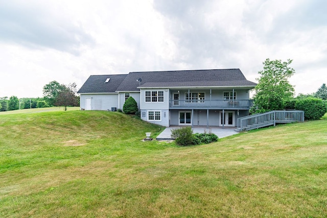 4299 County Road 20, Mount Gilead, OH 43338 - rear view of property featuring a patio, a lawn, and a wooden deck