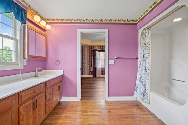 4299 County Road 20, Mount Gilead, OH 43338 - bathroom with vanity, wood finished floors, shower / bath combo, and crown molding