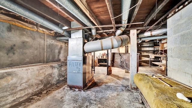 basement featuring heating unit