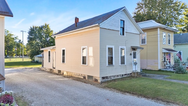 exterior space with a yard