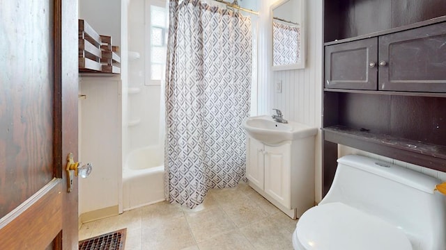 full bath featuring toilet, tile patterned floors, visible vents, vanity, and shower / tub combo with curtain