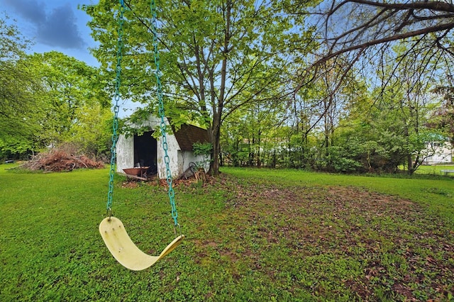 view of yard with a storage unit and an outbuilding