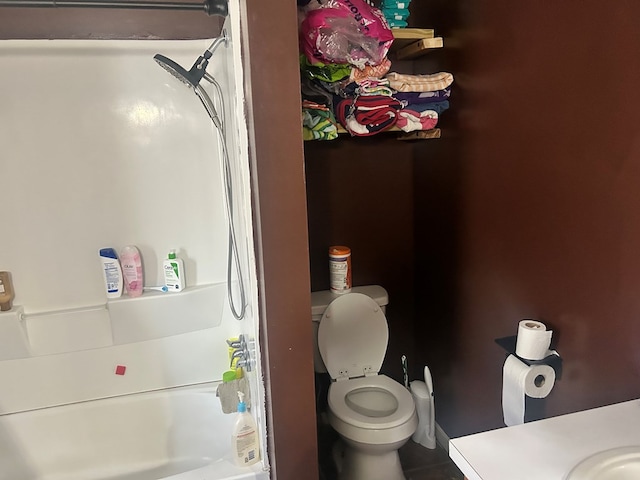 full bathroom with sink, toilet, tile patterned floors, and shower / bath combo