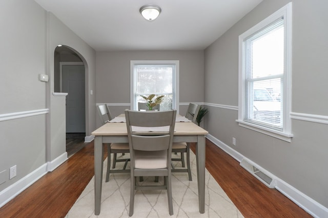 dining area featuring hardwood / wood-style floors