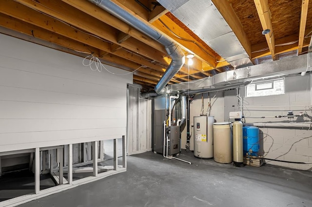 7326 State Route 19 Unit U3 L57-59, Mount Gilead, OH 43338 - basement with water heater, heating unit, a water pressure tank, and a water softener