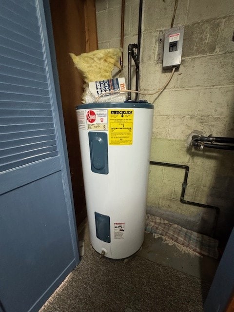 utility room featuring electric water heater