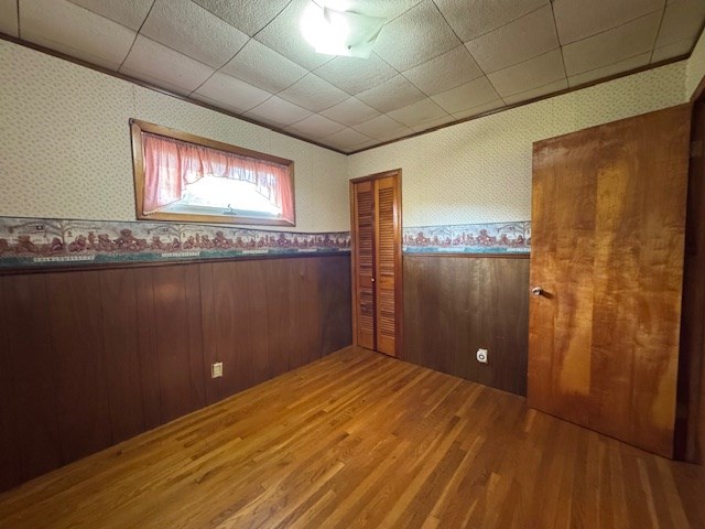 empty room featuring wood-type flooring