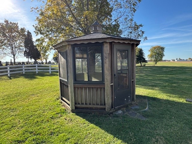 view of outdoor structure featuring a yard