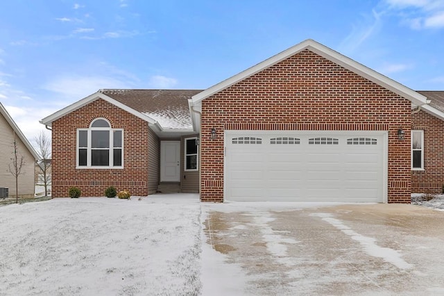 view of front of property with a garage