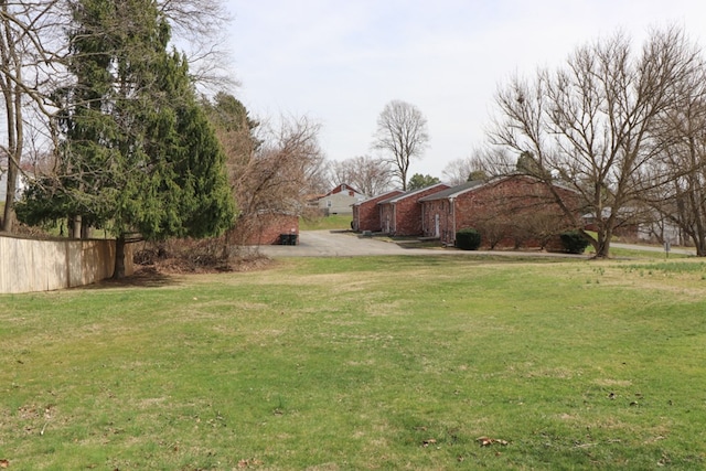 view of yard with fence