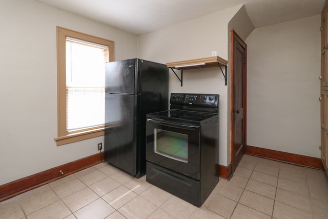 kitchen featuring black appliances, light tile patterned floors, and baseboards