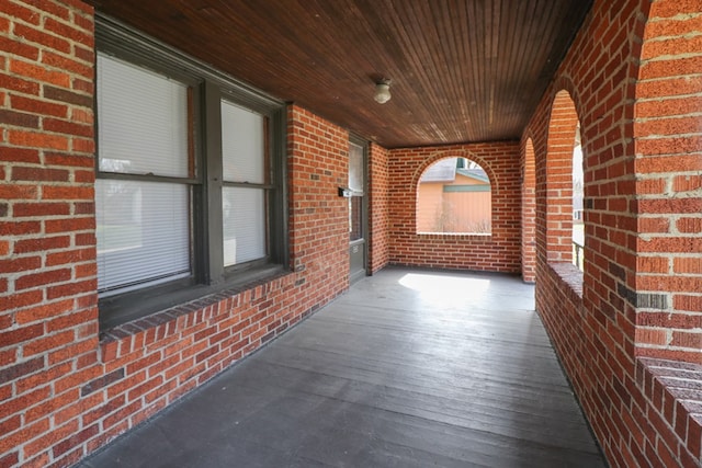 wooden terrace with a porch