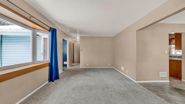 unfurnished room with carpet