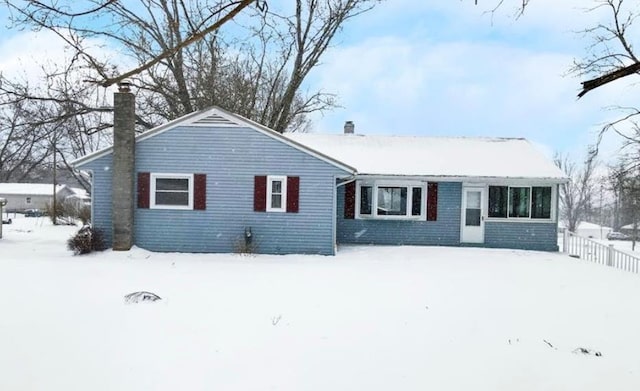 view of snow covered property