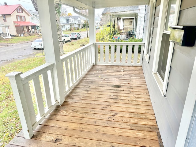 wooden terrace with covered porch