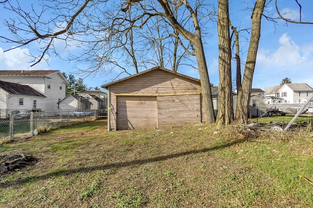 garage with a yard