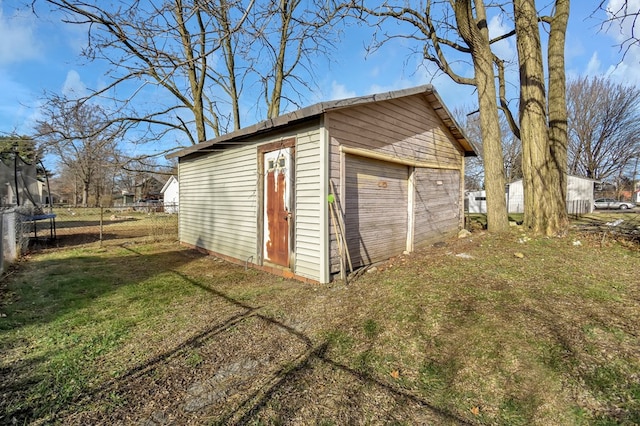 garage with a yard