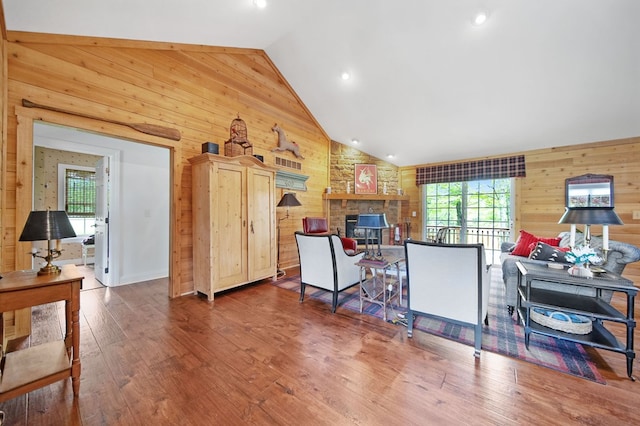 7326 State Route 19 Unit 1-2, Mount Gilead, OH 43338 - living room featuring wooden walls, wood finished floors, high vaulted ceiling, and recessed lighting