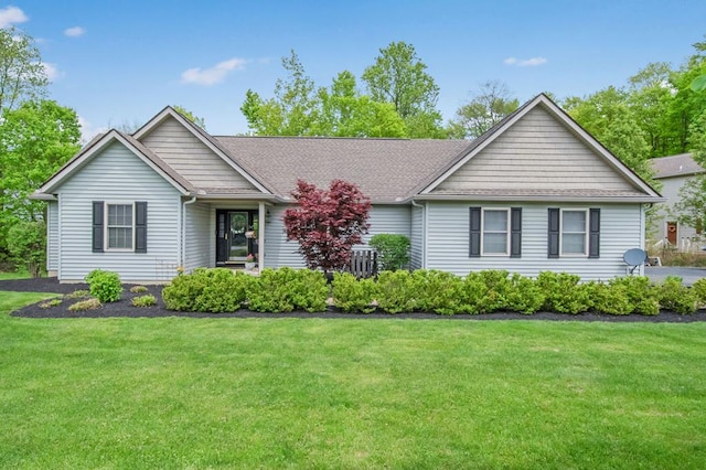 7326 State Route 19 Unit 1-2, Mount Gilead, OH 43338 - ranch-style home featuring a front lawn, a shingled roof, and cooling unit
