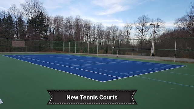 7326 State Route 19 Unit 1-2, Mount Gilead, OH 43338 - view of tennis court with fence and community basketball court