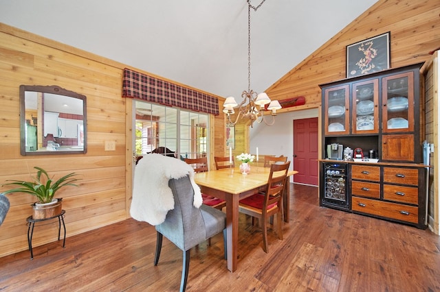 7326 State Route 19 Unit 1-2, Mount Gilead, OH 43338 - dining room with wood walls, a chandelier, wood finished floors, beverage cooler, and high vaulted ceiling