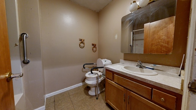 452 Daisy St, Mansfield, OH 44903 - full bathroom with vanity, toilet, tile patterned floors, a shower, and baseboards