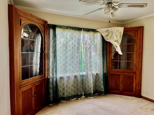 625 Grove Ave, Galion, OH 44833 - empty room featuring light colored carpet, a ceiling fan, and ornamental molding