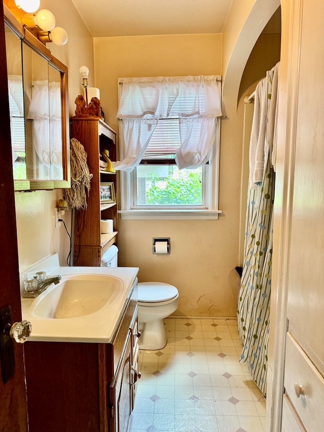 625 Grove Ave, Galion, OH 44833 - full bathroom with vanity, tile patterned floors, and curtained shower