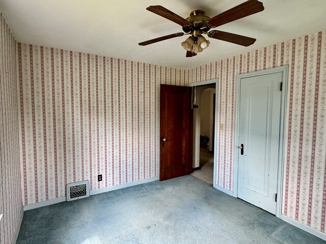 625 Grove Ave, Galion, OH 44833 - unfurnished bedroom with carpet and ceiling fan