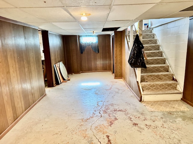 625 Grove Ave, Galion, OH 44833 - below grade area featuring wooden walls, stairs, and a paneled ceiling