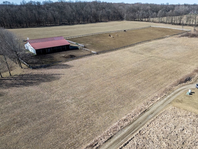 bird's eye view featuring a rural view and a view of trees