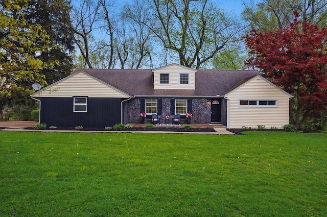 ranch-style home with brick siding and a front lawn