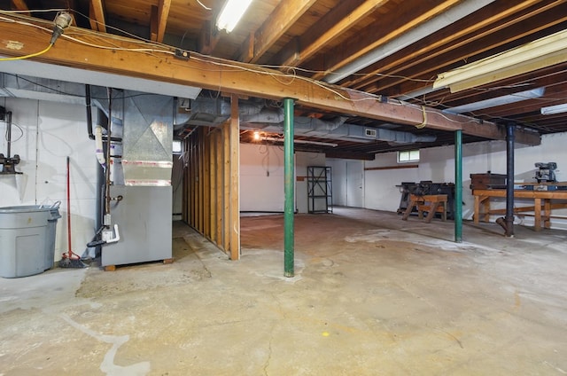 basement featuring heating unit