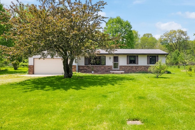 424 Day Rd, Mansfield, OH 44903 - view of front of home featuring driveway, a front lawn, a garage, and brick siding