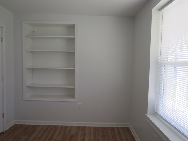 16 Earl Ave, Shelby, OH 44875 - unfurnished room with plenty of natural light and dark wood-style floors