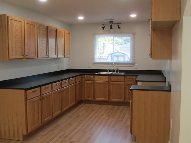 16 Earl Ave, Shelby, OH 44875 - kitchen with a sink, dark countertops, light wood-type flooring, and recessed lighting