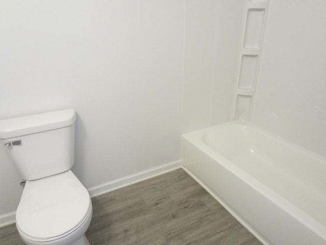 16 Earl Ave, Shelby, OH 44875 - full bath with wood finished floors, toilet, and baseboards