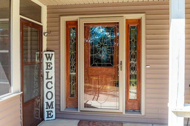 entrance to property with covered porch