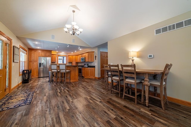 dining area with visible vents, baseboards, dark wood-type flooring, and a chandelier