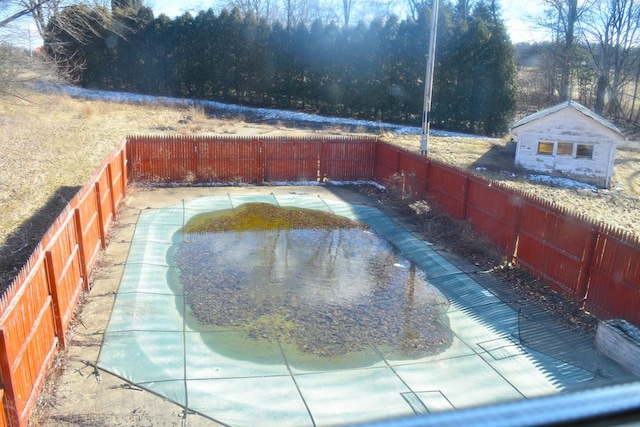 view of pool featuring a fenced backyard