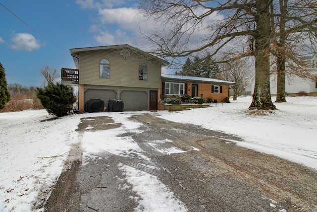 split level home with a garage