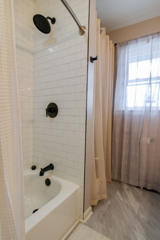 bathroom featuring shower / tub combo