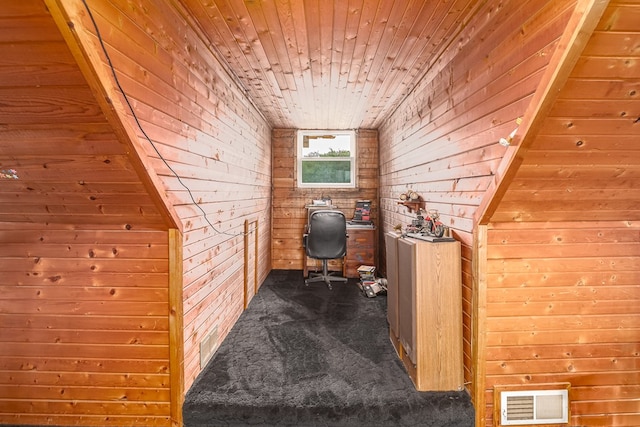 1163 Bowen Rd, Mansfield, OH 44903 - office area featuring wood walls, dark colored carpet, and wooden ceiling